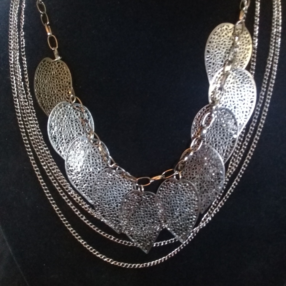 Platinum colored chain and leaves necklace